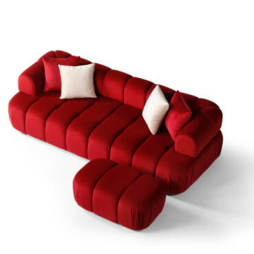 Red velvet sofa isolated on white background .