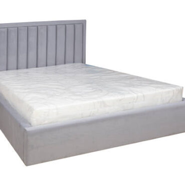 Double bed with soft headboard. Cushioned furniture.